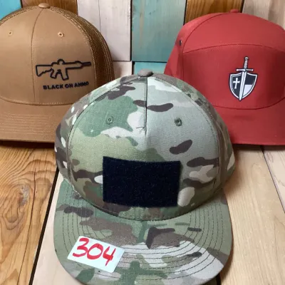 Lot of 3 Men’s Tactical Hats – Black On Ammo Trucker, Camo Hook & Loop Patch Cap & Zapped Gunny Red Sword Shield Cap