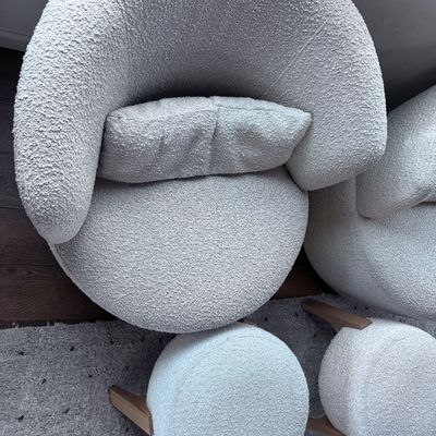 2 White swivel chairs with ottomans