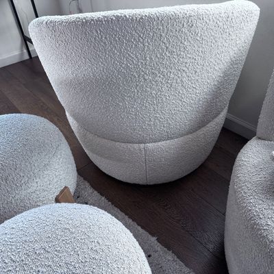 2 White swivel chairs with ottomans
