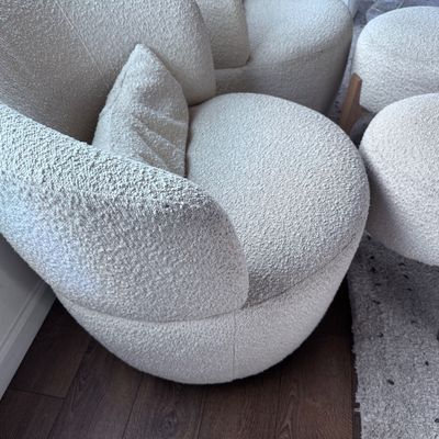 2 White swivel chairs with ottomans