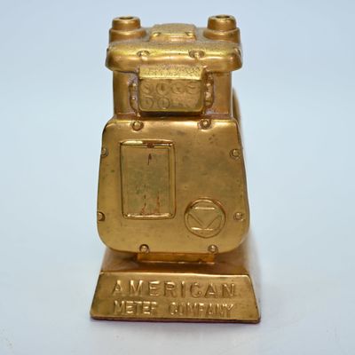 American Meter Company Gas Meter Advertising Paperweight - Gold