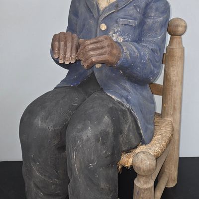 Sale Photo Thumbnail #161: African American Folk Carved Boy Sitting In Chair