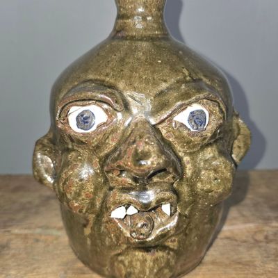 Sale Photo Thumbnail #235: Grace Nell Hewell Cigar Face Jug