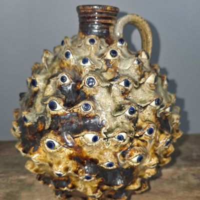 Sale Photo Thumbnail #229: Michael Ball Folk Pottery Eyeball Jug