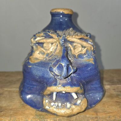 Sale Photo Thumbnail #290: W.T. McLennan Blue Folk Pottery Face Jug