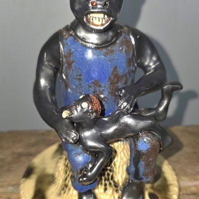 Sale Photo Thumbnail #190: Billy Ray Hussey Black Figural Boy Getting Spanked