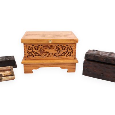 A Group of Decorative Boxes Including a Carved Maori Trinket Box and a Spanish Wood Chest