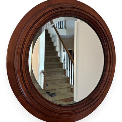 Late 19th Century Circular Carved Wood Wall Mirror with Beveled Plate