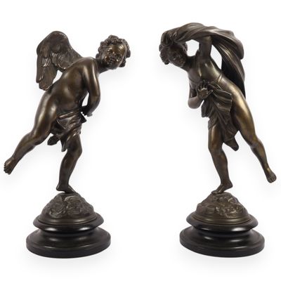 A Pair of Neoclassical Style Patinated Metal Figures of Cherubs on Ebonized Plinths