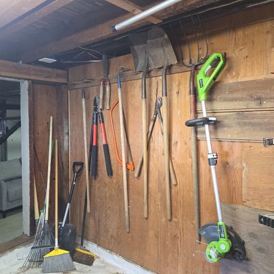 Sale Photo Thumbnail #284: Assorted Garden Tool Collection with Storage Rack