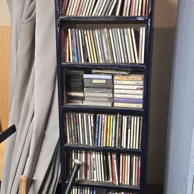 Vintage Industrial Steel Media Storage Tower with CD Collection