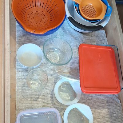 Assorted Kitchenware and Food Storage Lot with Pyrex Container and Multiple Strainers