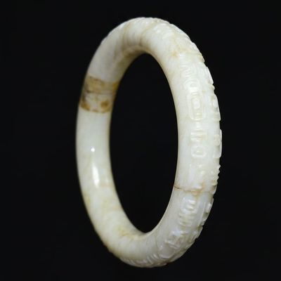 Sale Photo Thumbnail #287: Carved White Jadeite Bangle with Archaistic Motifs and Repair