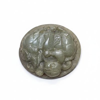 Sale Photo Thumbnail #195: Carved Nephrite Jade Bi Disc or Toggle with Mythical Creature