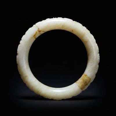 Sale Photo Thumbnail #285: Carved White Jadeite Bangle with Archaistic Motifs and Repair