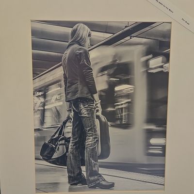 Passenger Patiently Waits for the Metro by Philip M. Shaw