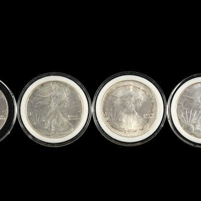 Sale Photo Thumbnail #332: Four American Eagle Silver Dollars