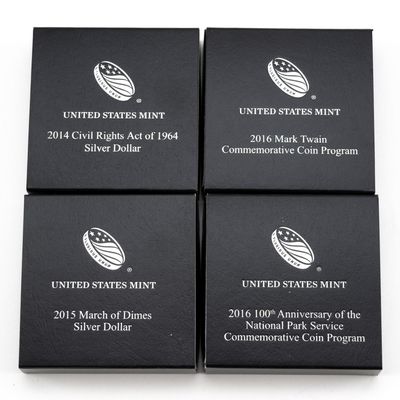 Sale Photo Thumbnail #318: Four Commemorative Silver Dollars