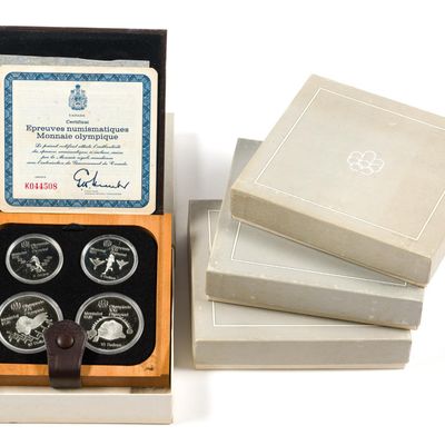 Sale Photo Thumbnail #234: Four 1976 Montreal Olympic Silver Coin Sets