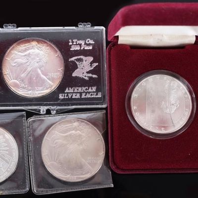 ASSORTED FINE SILVER ROUNDS/ AMERICAN EAGLES - (4)