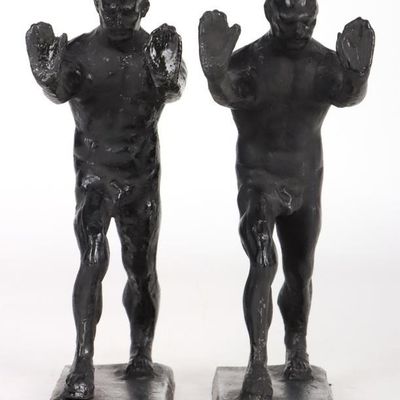 CAST IRON MEN PUSHING MODERN BOOKEND PAIR