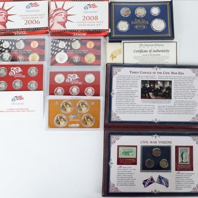 ASSORTED U.S. YEAR/ ERA COINAGE SETS - (4)