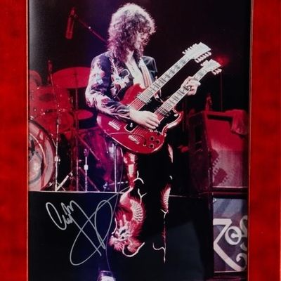 Sale Photo Thumbnail #431: JIMMY PAGE SIGNED STAGE PHOTO FRAMED W/ COA