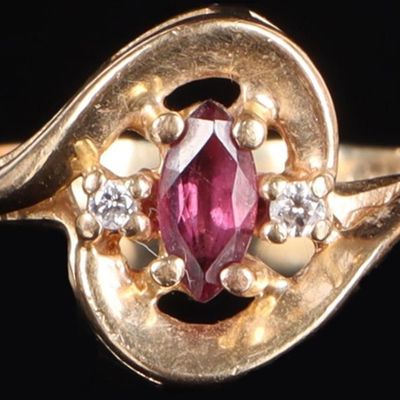 Sale Photo Thumbnail #161: 10K YELLOW GOLD LADIES RING W/ MARQUISE RUBY & DIA