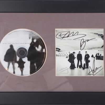 Sale Photo Thumbnail #434: U2 SIGNED CD ALL THAT YOU CANT LEAVE BEHIND FRAMED