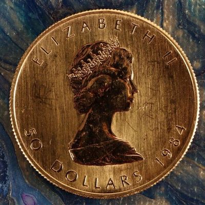 Sale Photo Thumbnail #38: FINE GOLD 1 OZT 1984 $50 CANADIAN MAPLE LEAF MS