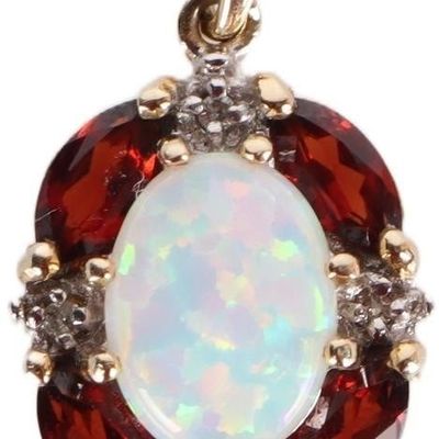 Sale Photo Thumbnail #272: 10K YELLOW GOLD LADIES PENDANT W/ OPAL GARNET DIAS