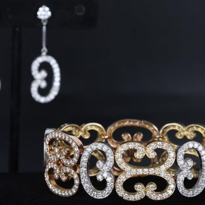 Sale Photo Thumbnail #310: 18K TRI-COLOR GOLD NATURAL DIAMOND SCROLL JEWELRY