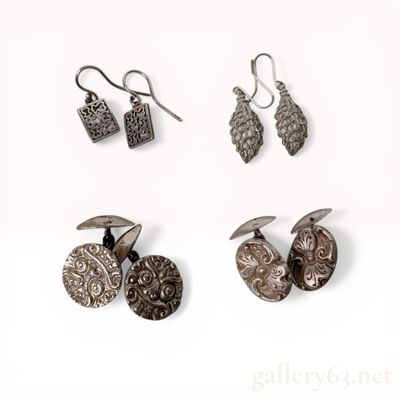 A Collection of Four Sets of Silver and.800 Silver Jewelry Including Spinx Cufflinks