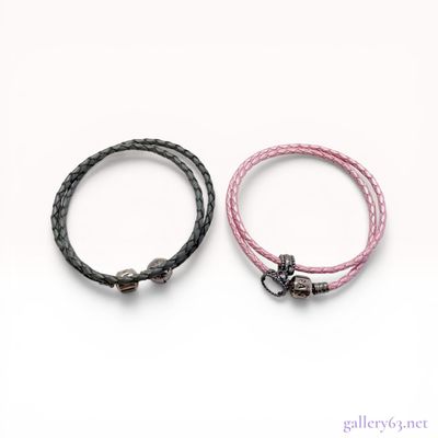 Two Pandora Double-Wrap Braided Leather Bracelets with Charms