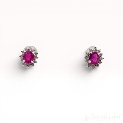 A Pair of Ruby and Diamond Cluster Stud Earrings in 18K White Gold