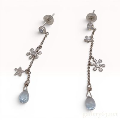 A Pair of 10K White Gold Celestial and Snowflake Drop Earrings