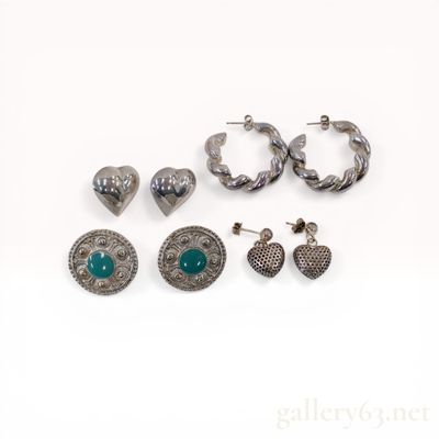 An Assortment of Four Pairs of Sterling Silver Earrings