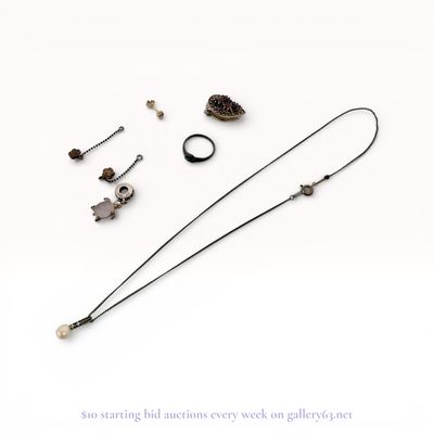 An Assortment of Sterling Silver and Costume Jewelry Including Pandora