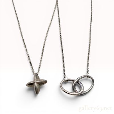 Two Tiffany and Co. Elsa Peretti Sterling Silver Star and Interlocking Circles Necklaces