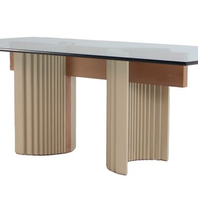 OAK, PAINTED WOOD, AND BRASS DINING TABLE WITH A GLASS TOP C 1980.