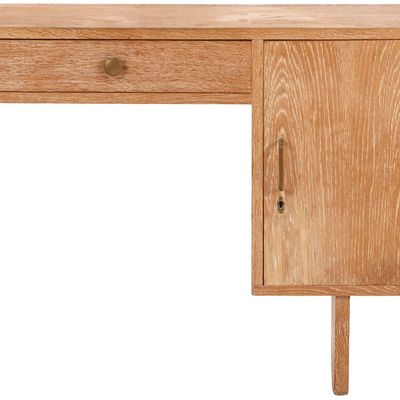 A PETITE FRENCH CERUSED OAK WRITING DESK HAVING A SINGLE DOOR OPENING TO A FITTED INTERIOR C 1950.