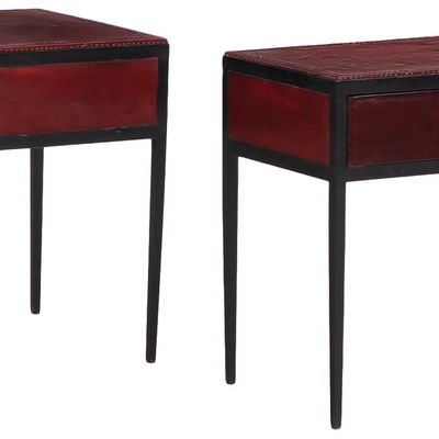 PAINTED IRON AND LEATHER END TABLES HAVING A SINGLE DRAWER IN THE MANNER OF JEAN-MICHEL FRANK.