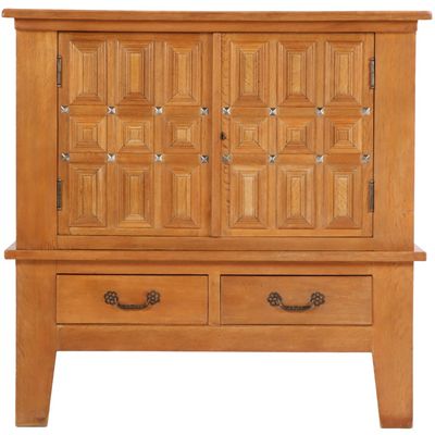 TWO PIECE OAK BAR CABINET WITH METAL MOUNTS IN THE BRUTALIST STYLE C 1960.