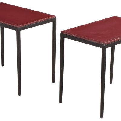 PAINTED IRON AND LEATHER END TABLES IN THE MANNER OF JEAN-MICHEL FRANK.