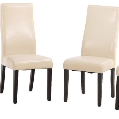 FOUR MODERN LEATHER DINING CHAIRS.