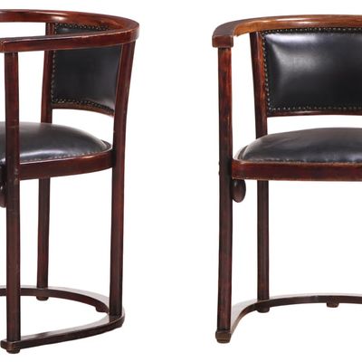 PAIR OF WOOD AND LEATHER ARM CHAIRS LABELED THONET C 1910.
