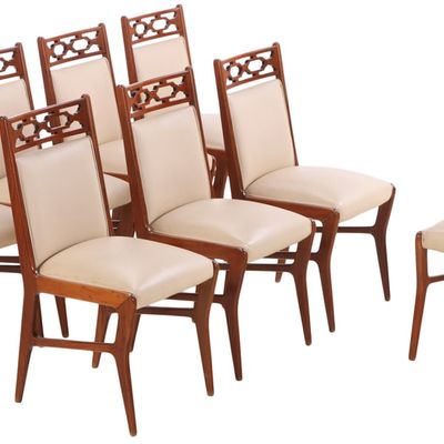 EIGHT UPHOLSTERED WALNUT DINING CHAIRS C 1950.