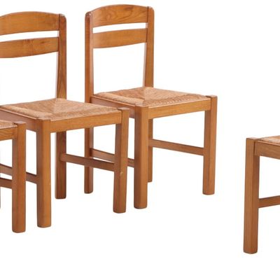FOUR OAK AND RUSH SIDECHAIRS IN THE MANNER OF MAISON REGAIN C 1960.