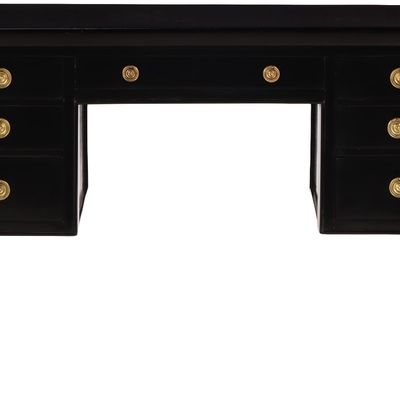 EBONIZED WOOD AND BRASS WRITING DESK C 1950 HAVING SEVEN DRAWERS AND A SLIGHT CURVE TO THE TOP.