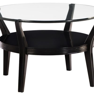 EBONIZED WOOD COFFEE TABLE HAVING A THICK GLASS TOP C 1960 ATTRIBUTED TO ENGLANDER AND BONTA.
